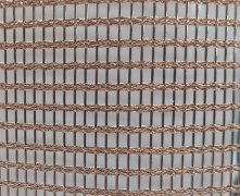 Metal decorative mesh is made of metal rods and wires