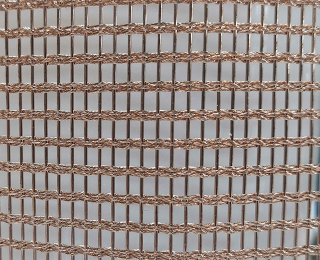 Metal decorative mesh is made of metal rods and wires