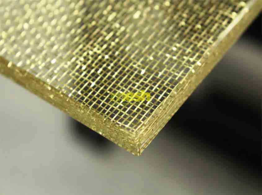 What types of metal mesh are commonly used in laminated glass