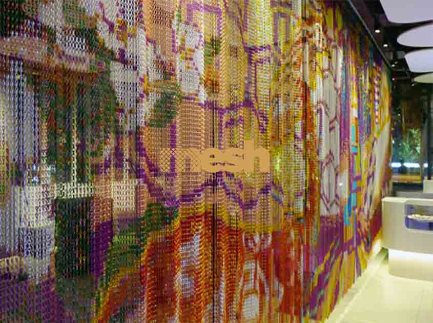 How does Chain Link Curtain provide a sense of openness in interior designs