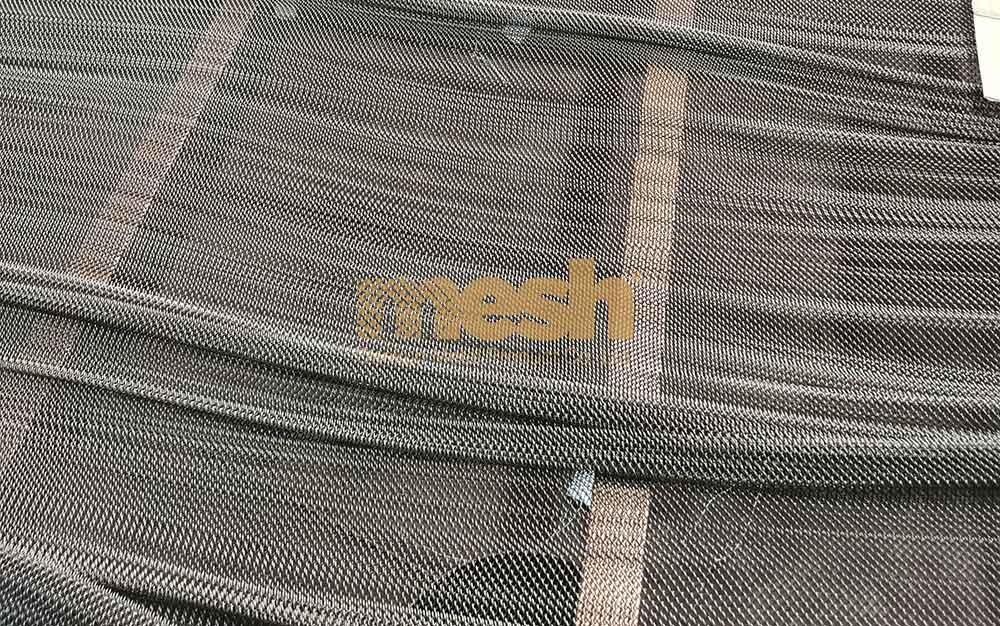 Metal Coil Drapery vs. Mesh Screens: An Elegant Debate