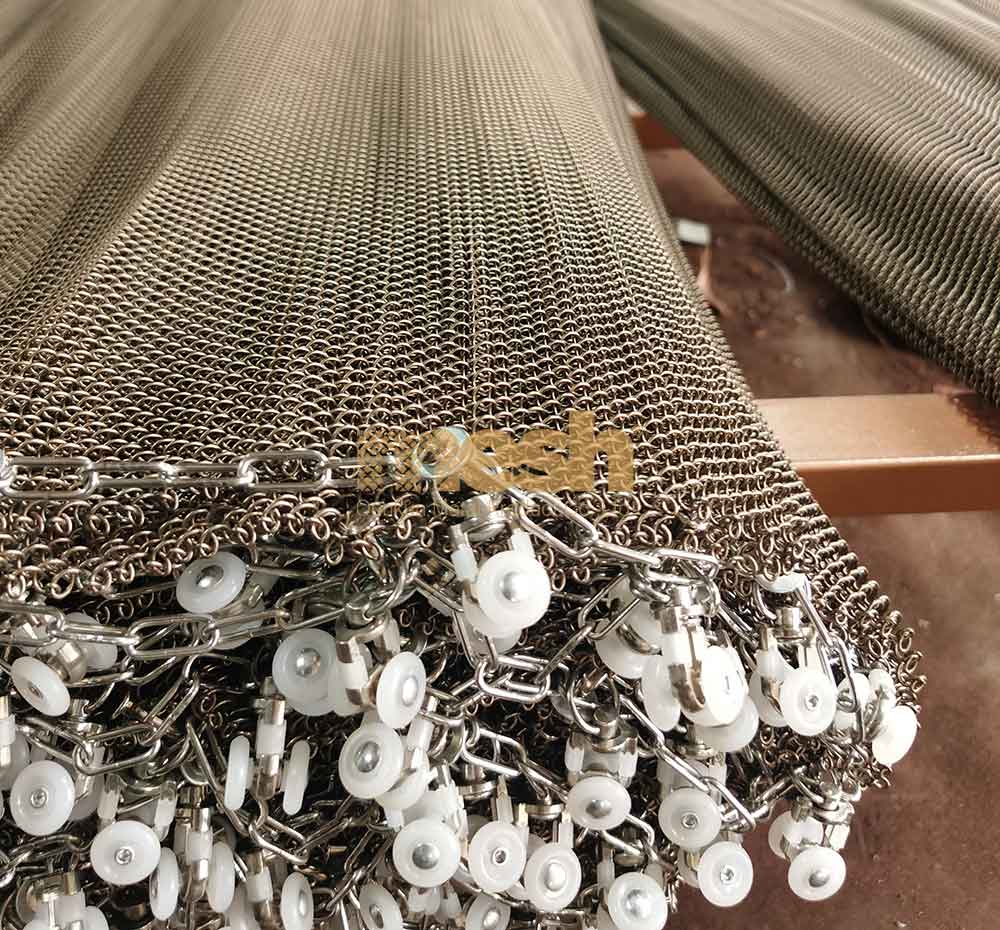 Metal Coil Drapery vs. Mesh Screens: An Elegant Debate